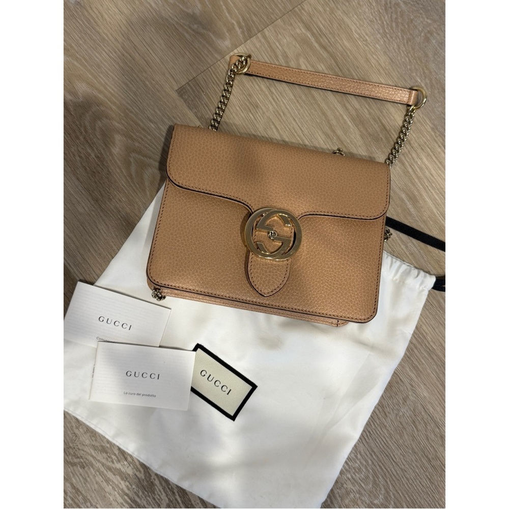 Authentic Gucci crossbody bag with a gold chain